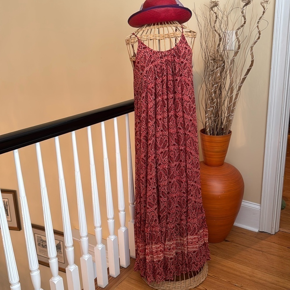 Idano beautiful cream colored dress with small red flowers and black on leaves